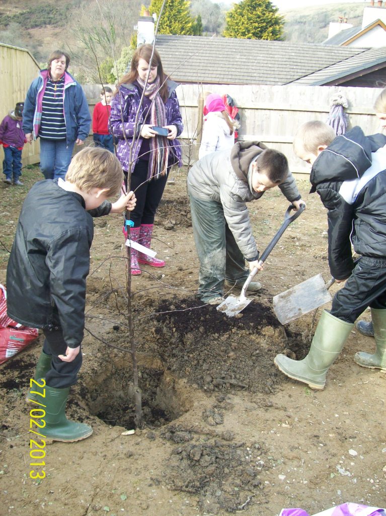 Village children planting trees